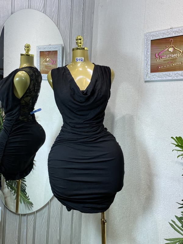 Sleek Black Ruched Dress with Lace Detail