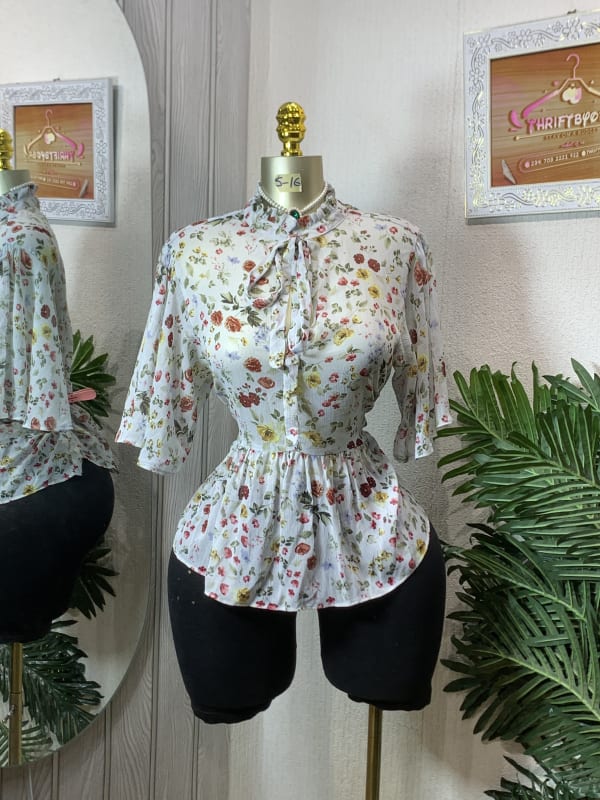 Floral Print Ruffled Peplum Blouse with Tie Neck