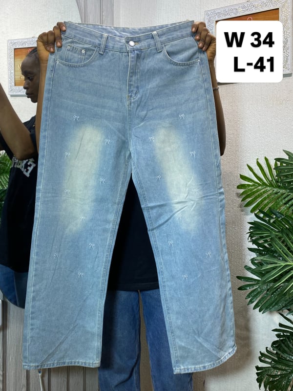 Light Wash Denim Jeans with Embroidered Bow Detail