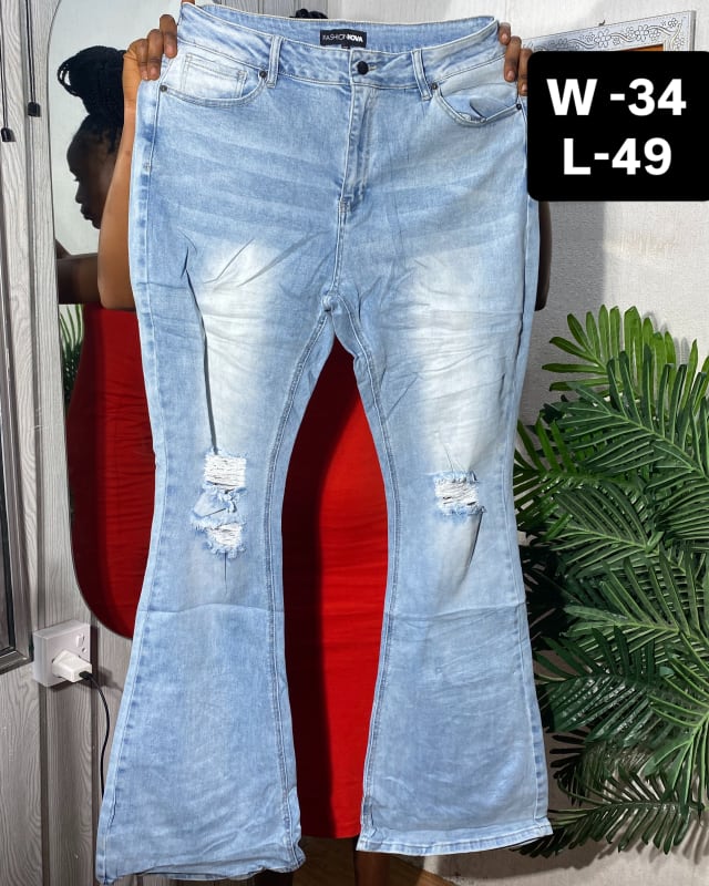 Fashion Nova Distressed Light Wash Flare Jeans