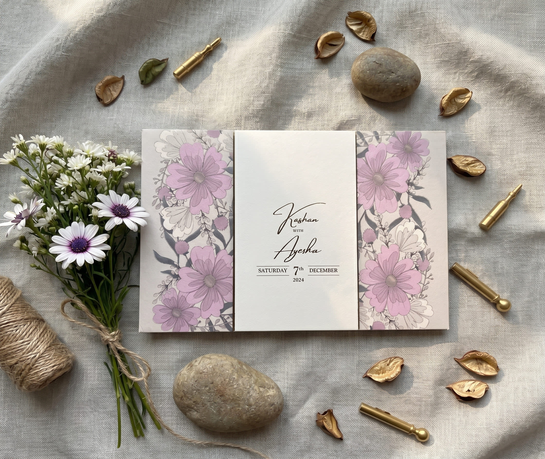 Landscape wedding card with lilac and mauve cosmos floral side panels and a cream centre band by Shahi Bulawa Karachi