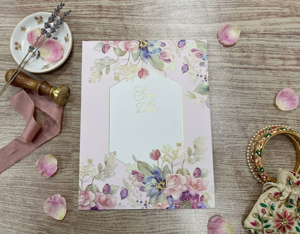 A blush pink floral wedding card suite with watercolor pastel flowers