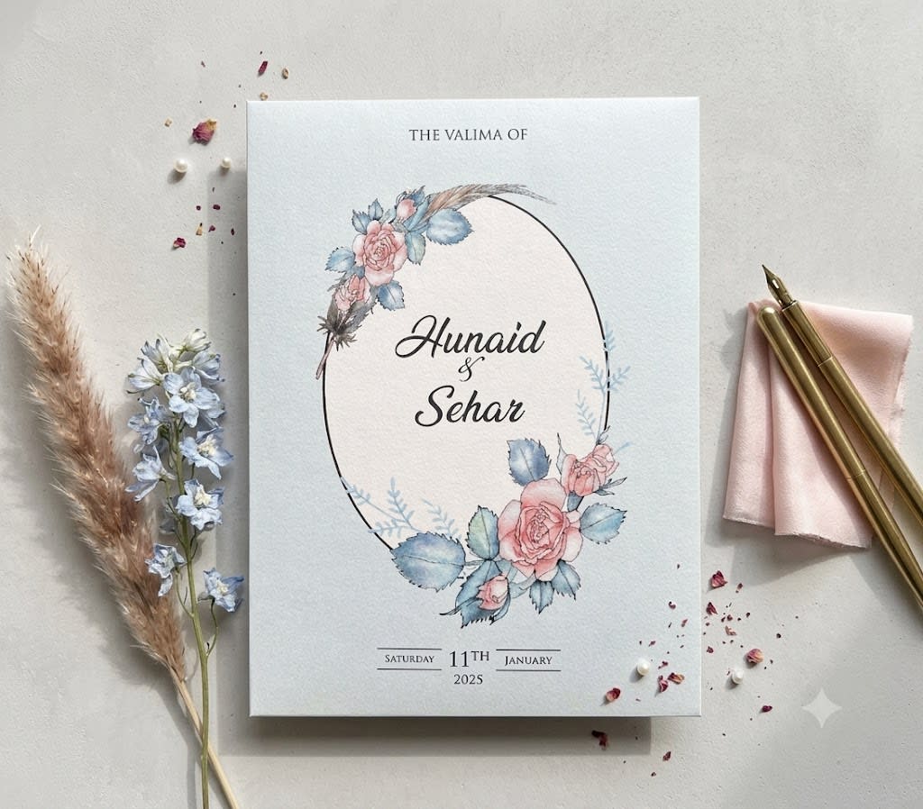 A romantic watercolor rose wedding invitation with an oval frame