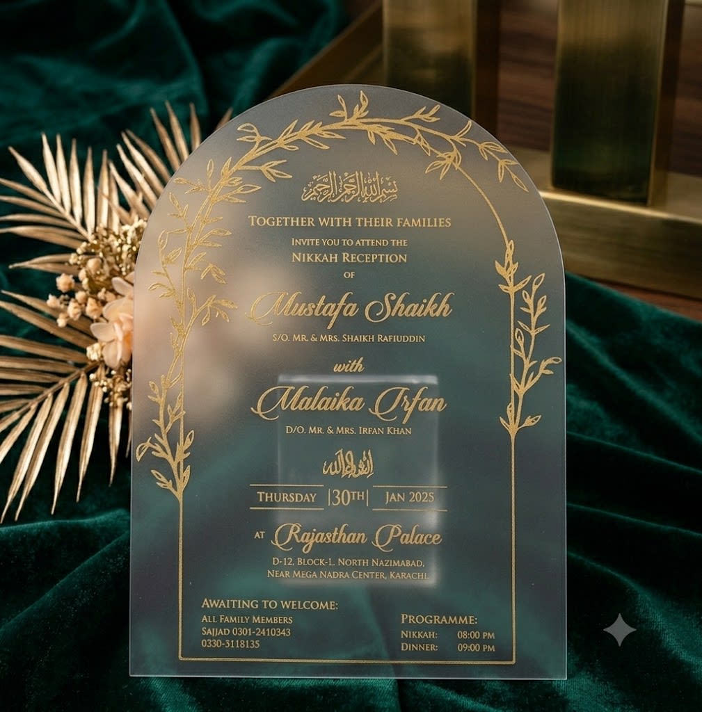 Green frosted acrylic wedding card with an arched gold vine border