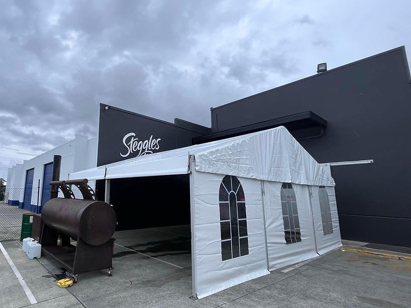 Marquee interior Brisbane — timber flooring inside a clearspan marquee reception