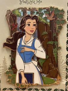 Forest Wanderer: Belle in woods, smiling and holding book image