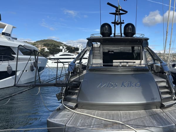 Rear view of a yacht in an Imperia marina with distant hills