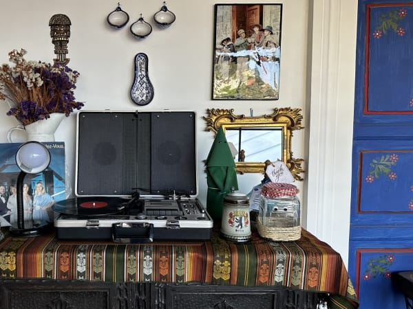 Vintage record player and nostalgic interior details inside a hotel in Quito