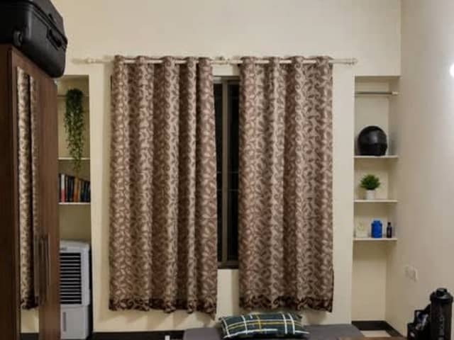 Semi-Furnished 2BHK Flat in Kharadi — living area and home amenities