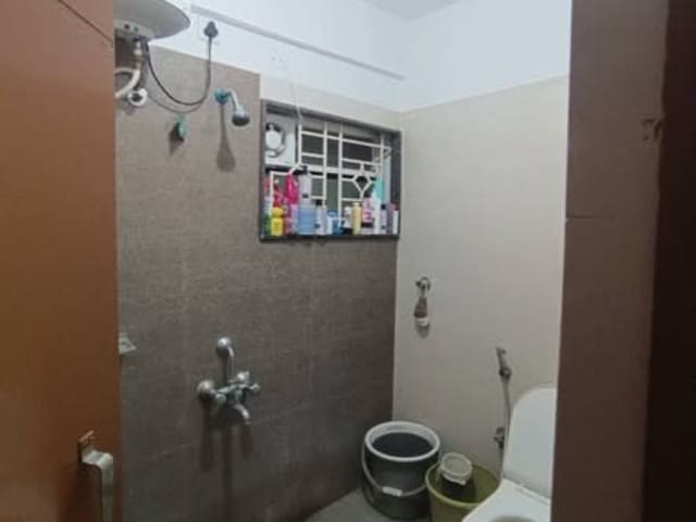 Female Roommate Needed in 1BHK Shared Apartment — living area and home amenities