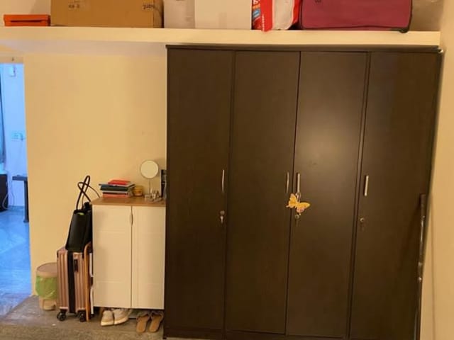 Single Room with Private Washroom in a 2BHK Flat | Koramangala 8th Block — living area and home amenities