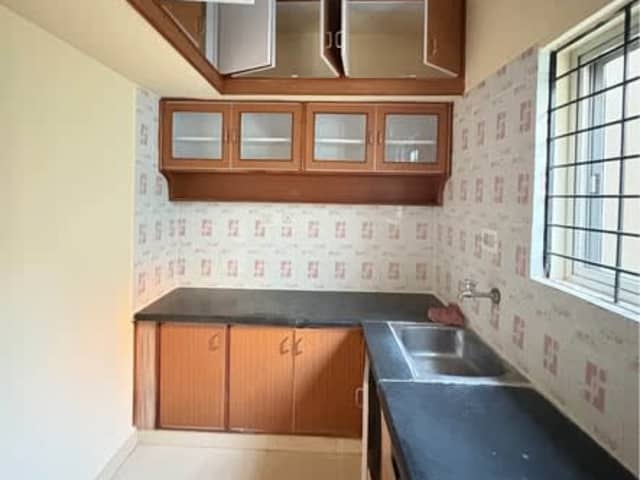 Semi Furnished 2BHK Flat near Bagmane Tech Park — living area and home amenities