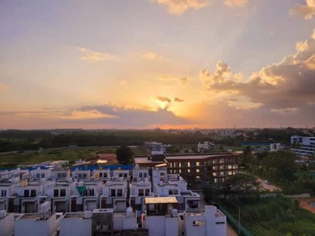 Fully Furnished Room in 3BHK near Wipro — living area and home amenities