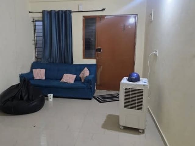 Fully Furnished Room in 2BHK at SLV Residency, Munnekollal — living area and home amenities