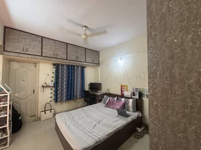 Room Available in Semi-Furnished 2BHK — Green Glen Layout — bedroom interior view
