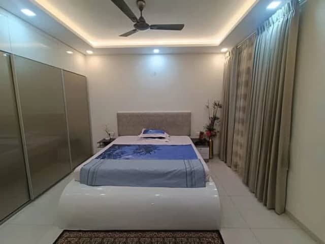 Master Bedroom in 3BHK at Bren Champions Square — living area and home amenities