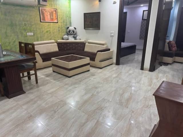 1 Male Flatmate Required for 3BHK in Sector 51 — living area and home amenities