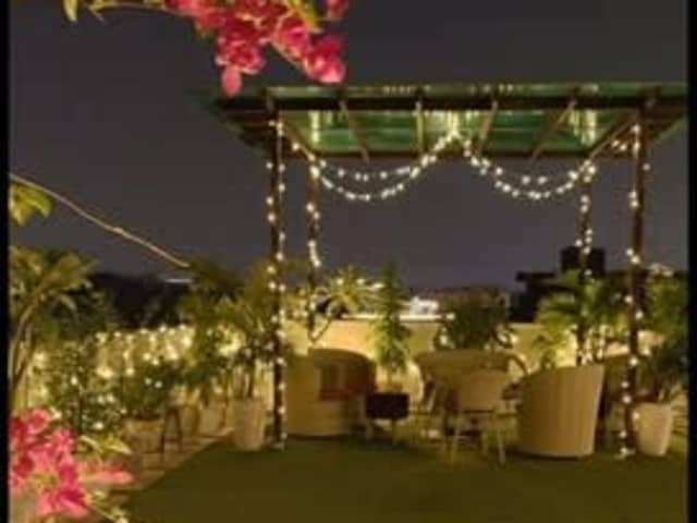 Beautiful top-floor builder floor with exclusive terrace in Sushant Lok — living area and home amenities