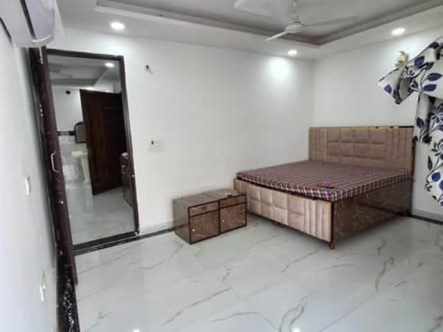 Pre-Occupied Room Available – Sector 46, Gurugram — living area and home amenities