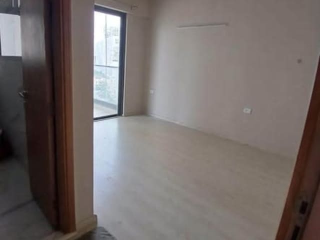 2 BHK Semi Furnished with AC in M3M Heights — living area and home amenities