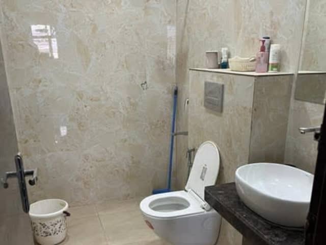 Fully Furnished Room in Sector 46 — living area and home amenities