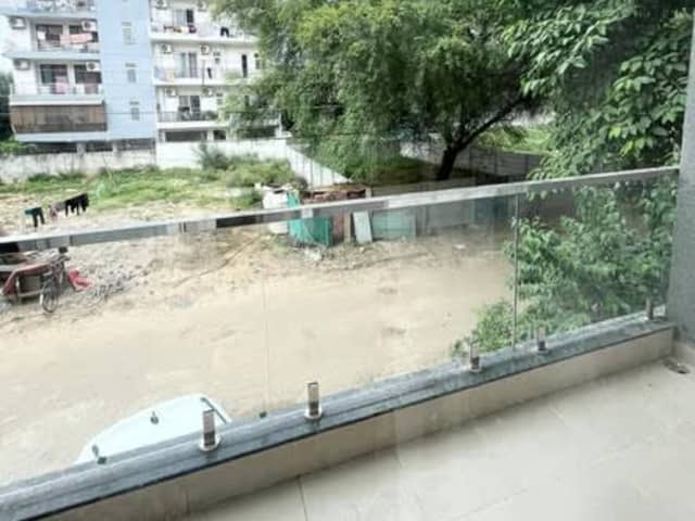 Brand New 1 BHK in Sector 57 — living area and home amenities