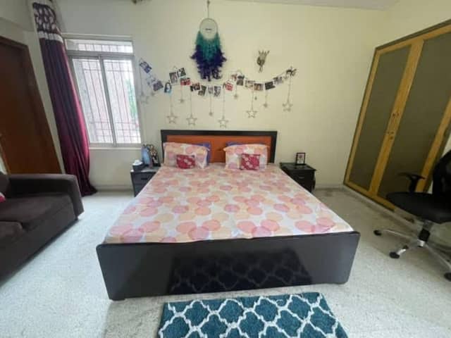 Fully Furnished Master Bedroom in 4BHK Flat — living area and home amenities