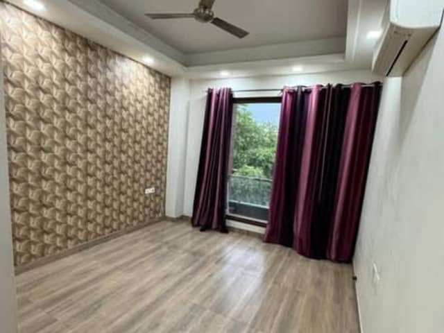 Semi-furnished 3BHK in Sector 57, Gurgaon — bedroom interior view