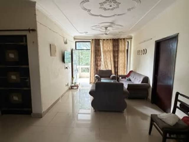 Room available in 4BHK Flat, Sector 52, Gurugram — bedroom interior view