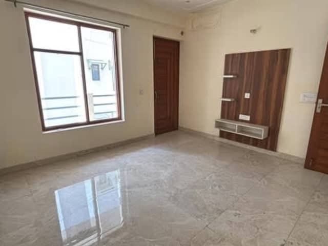 2 BHK Semi Furnished Flat for Family — living area and home amenities