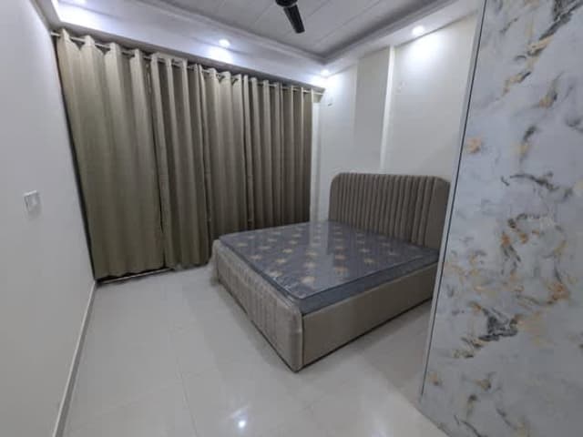 1BHK in DLF Phase 3, Gurgaon — living area and home amenities