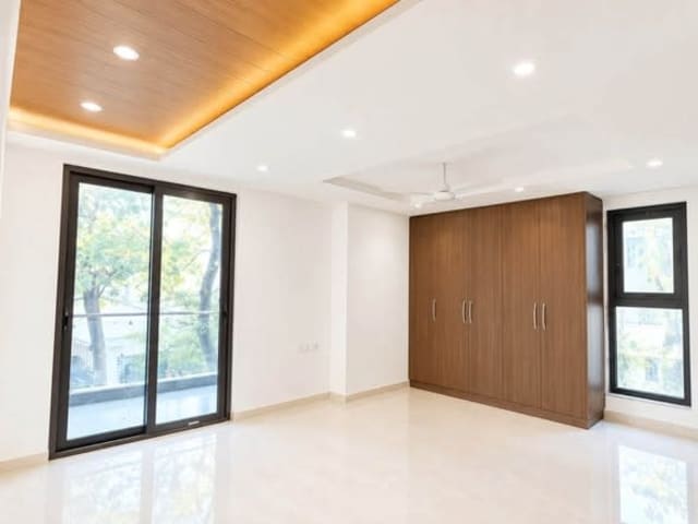 Master room in DLF Phase 1 — living area and home amenities