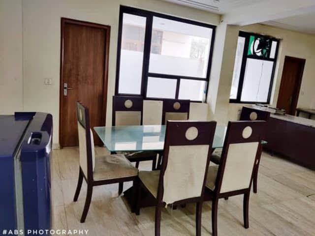 Unitech Girls PG — living area and home amenities