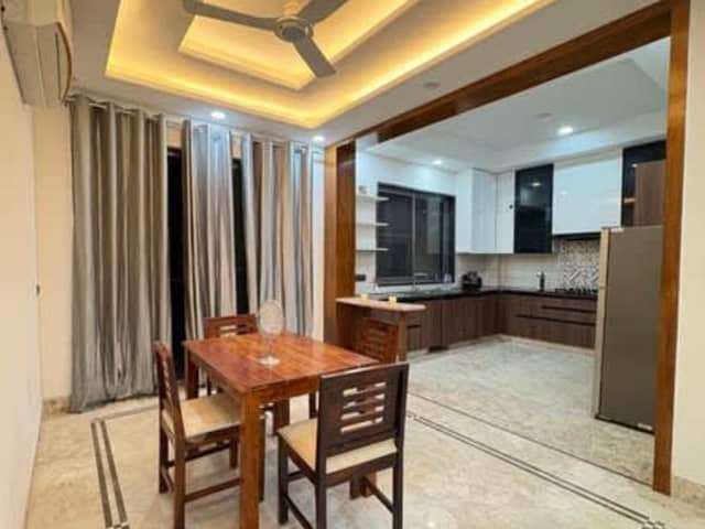 Male Flatmate Needed – Fully Furnished 3BHK — living area and home amenities