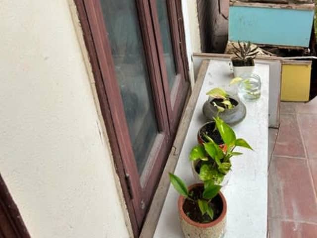ROOM AVAILABLE IN SHARED 3BHK FEMALE FLAT — living area and home amenities