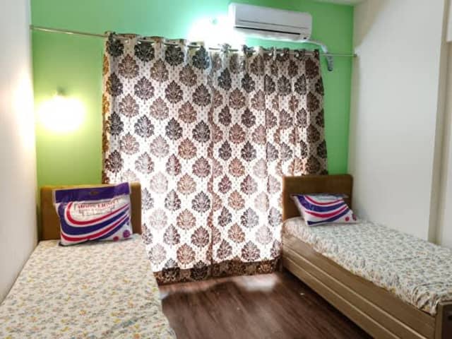 Premium Girl's PG Accommodation in Santacruz East — living area and home amenities