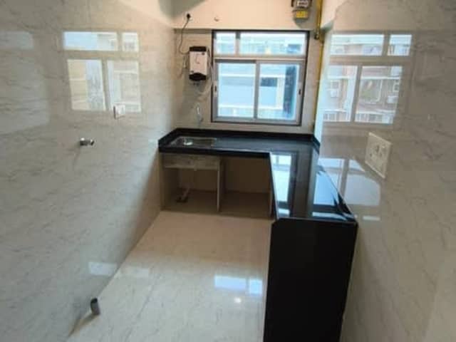 2BHK Semi-Furnished flat at Vikhroli East — bedroom interior view