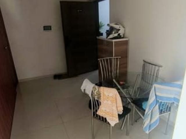 Double Occupancy in Marol, Andheri East — living area and home amenities