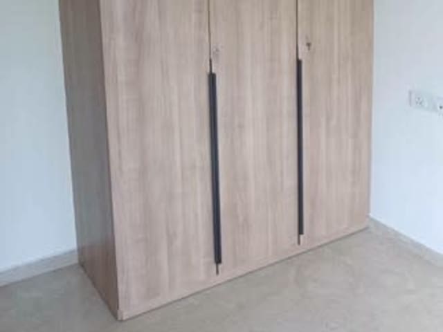 1BHK Furnished Flat in Hiranandani Powai — bedroom interior view