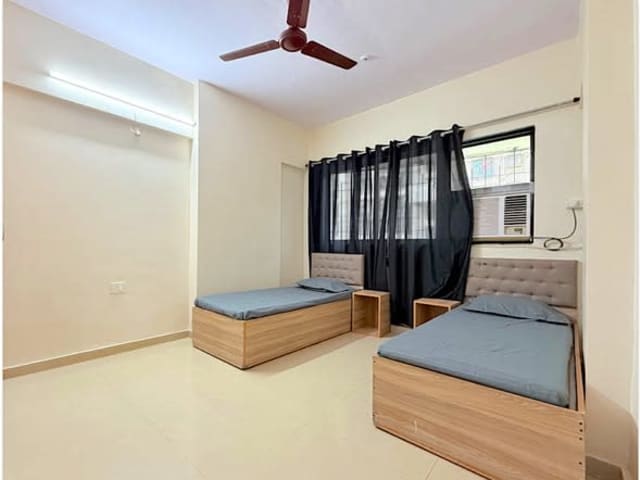 Fully Furnished Shared Flat In Mumbai | For Males — living area and home amenities