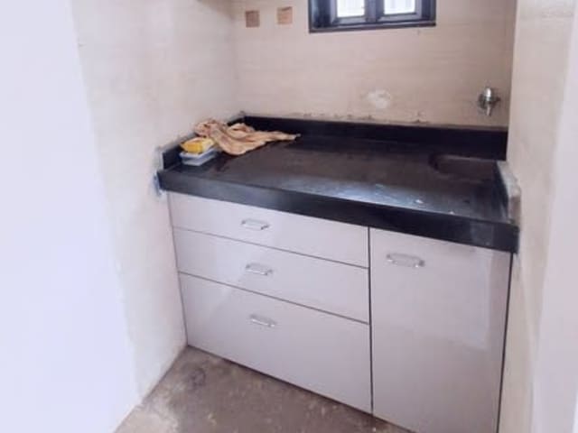 1RK Converted 1BHK in Chembur Naka — living area and home amenities
