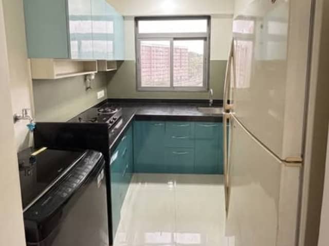 1BHK Semi-Furnished flat at Ghatkopar West — bedroom interior view