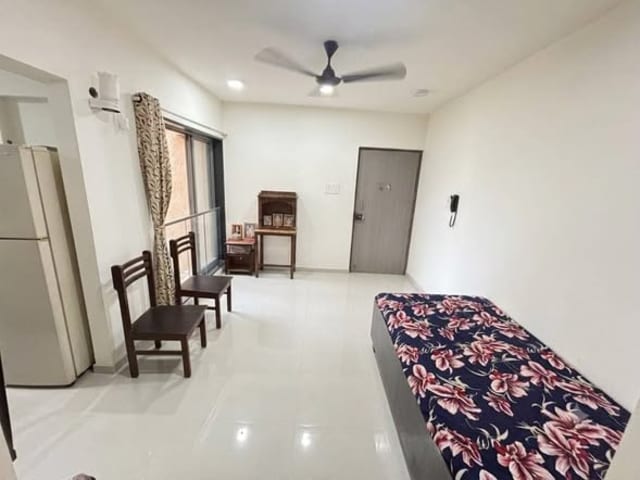1BHK Semi-Furnished flat at Ghatkopar West — living area and home amenities