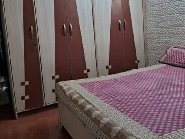 1BHK Furnished Flat in Andheri East — living area and home amenities