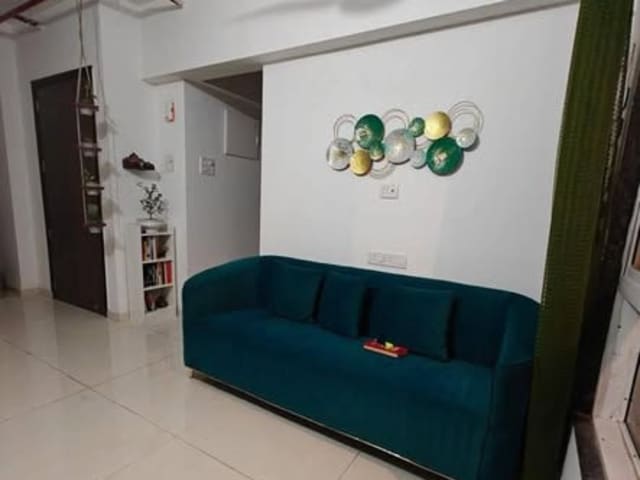2BHK Master Bedroom for Rent in Goregaon West — living area and home amenities