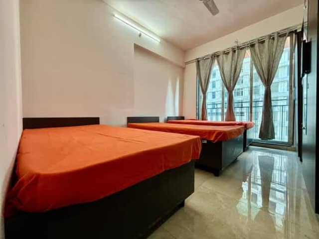 Fully Furnished PG in Andheri East — living area and home amenities