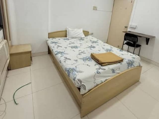 PG for Men in Andheri East, Mumbai — living area and home amenities
