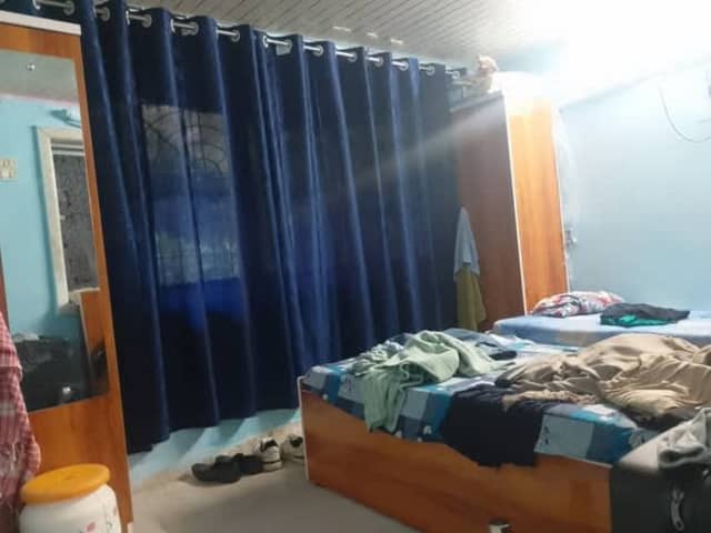 PG for men in Andheri East — living area and home amenities