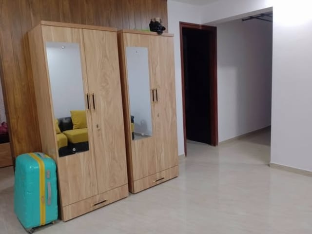Girls' Sharing Flat in Chakala Andheri East — living area and home amenities