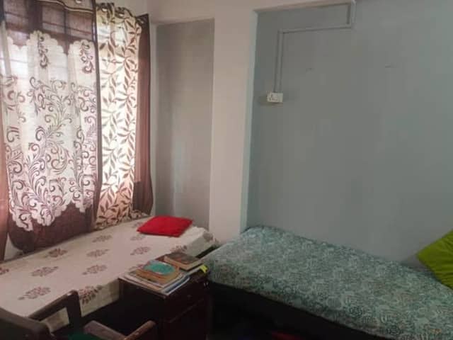 Fully furnished 1Rk Flat in Patliputra Nagar — living area and home amenities